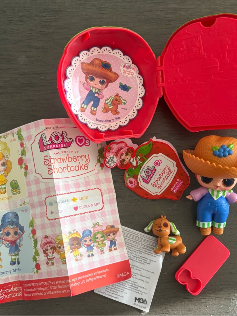 L.O.L. Surprise! Strawberry Shortcake Doll Playset with Red Case and Orange Hat